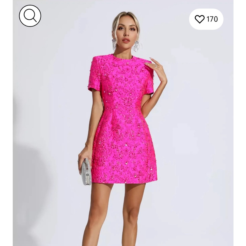 Bright pink jacquard floral mini dress.